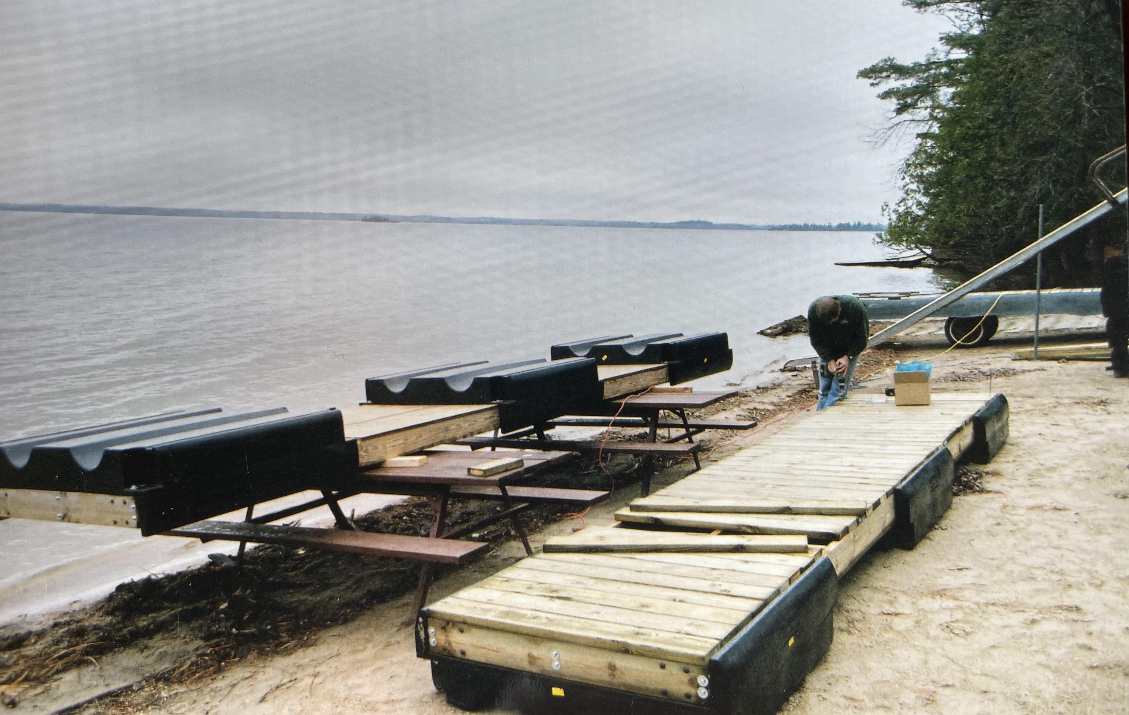 Summer 2010 - Friend and Guest of Cabin O' Pines Resort, Jim Nesbitt, helping to construct slip docks to expand the Main Dock